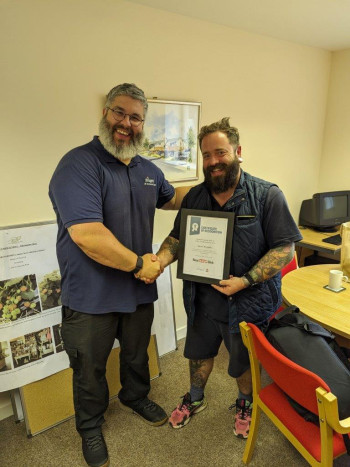 Broiler Technical Manager and Club champion Kieron Daniels with Gold Award winner Gavin Asquith